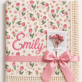 Tulip Burst muslin baby blanket with pink tulip print, Emily embroidered in pink, cream fringe and pink ribbon.